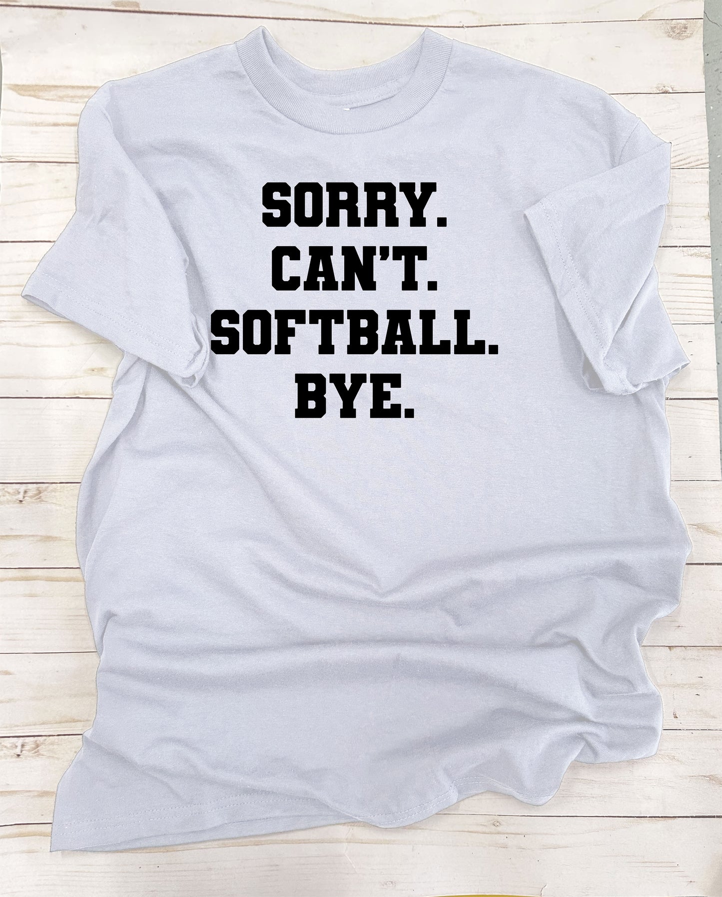 Sorry. Can't. Softball. Bye. Solid-Color, Short Sleeve T-Shirt