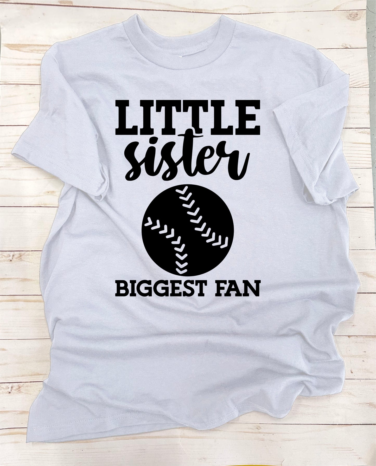 Little Sister, Biggest Fan. Solid-Color, Short Sleeve T-Shirt